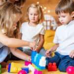 Childcare Menu & Healthy Meals 11 Toddler in helmet riding red balance bike.